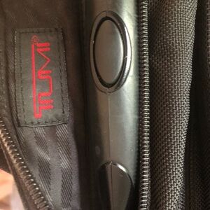Tumi Black Woven Roller bag